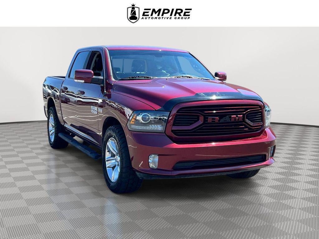 2018 RAM 1500 Sport in Red Pearl — front three-quarter view