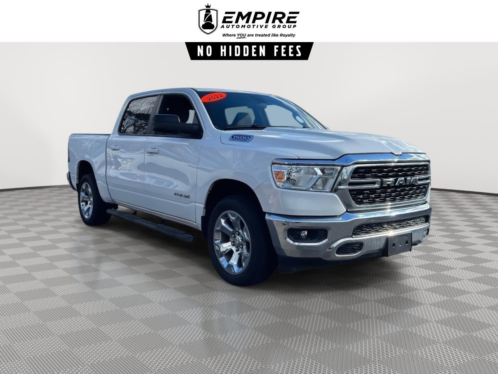 2022 RAM 1500 Big Horn Crew Cab 4x4 57' Box in Bright White Clearcoat — front three-quarter view