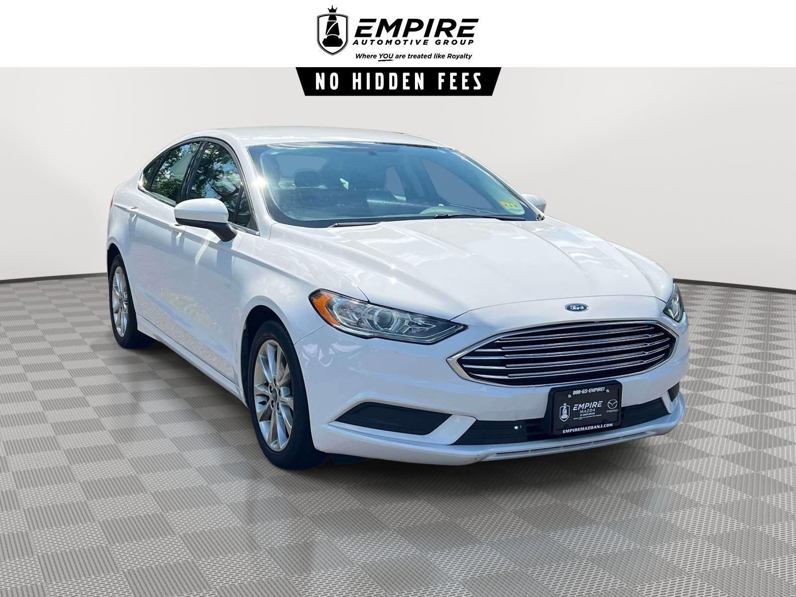 2017 Ford Fusion SE in Oxford White — front three-quarter view