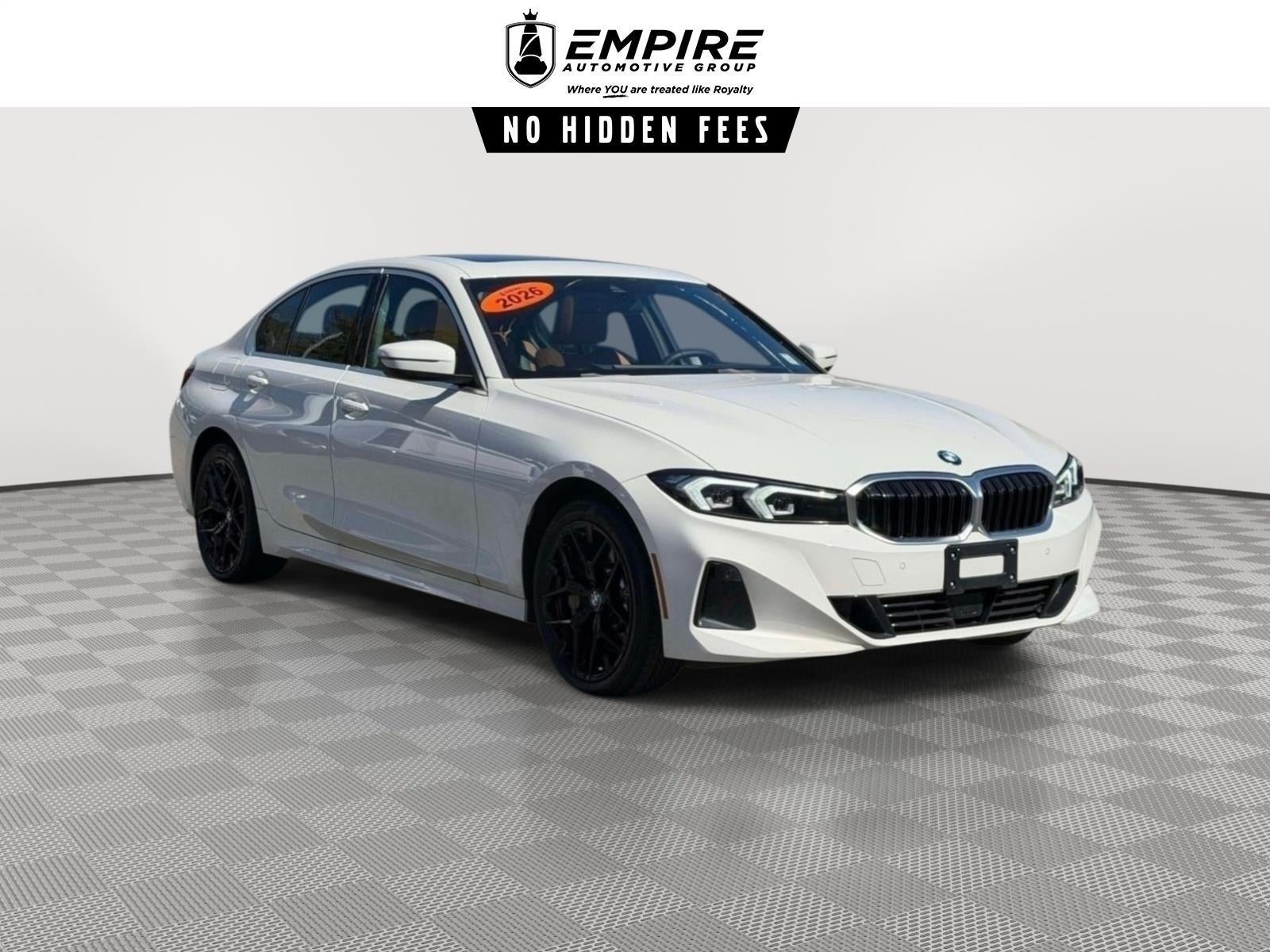 2026 BMW 3 Series 330i xDrive in Alpine White — front three-quarter view