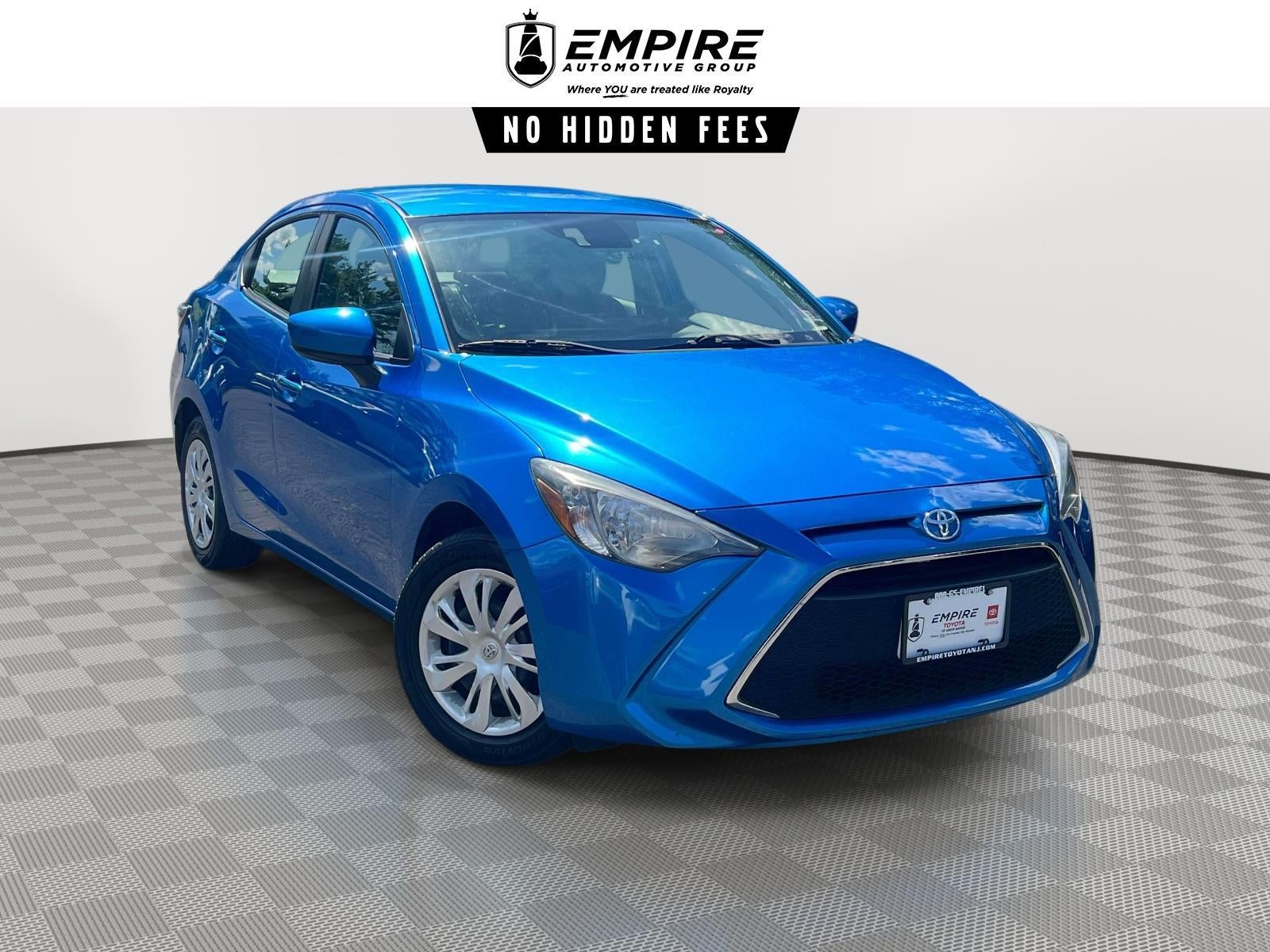 2019 Toyota Yaris L in Blue — front three-quarter view