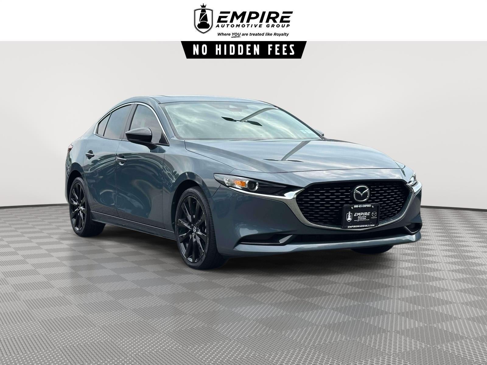 2023 Mazda Mazda3 Sedan 2.5 S Carbon Edition in Polymetal Gray Metallic — front three-quarter view