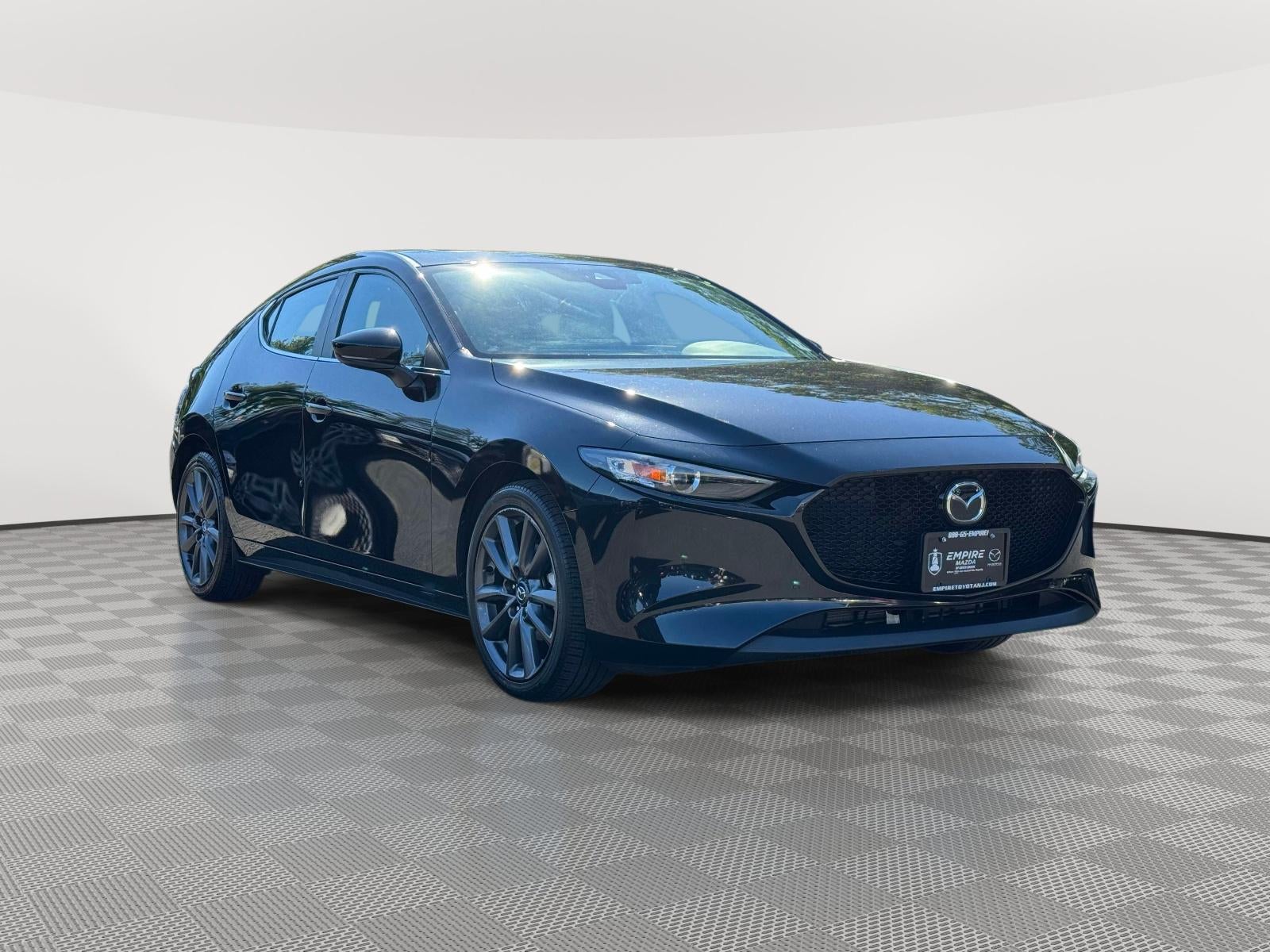 2023 Mazda Mazda3 Hatchback 2.5 S Preferred in Jet Black Mica — front three-quarter view