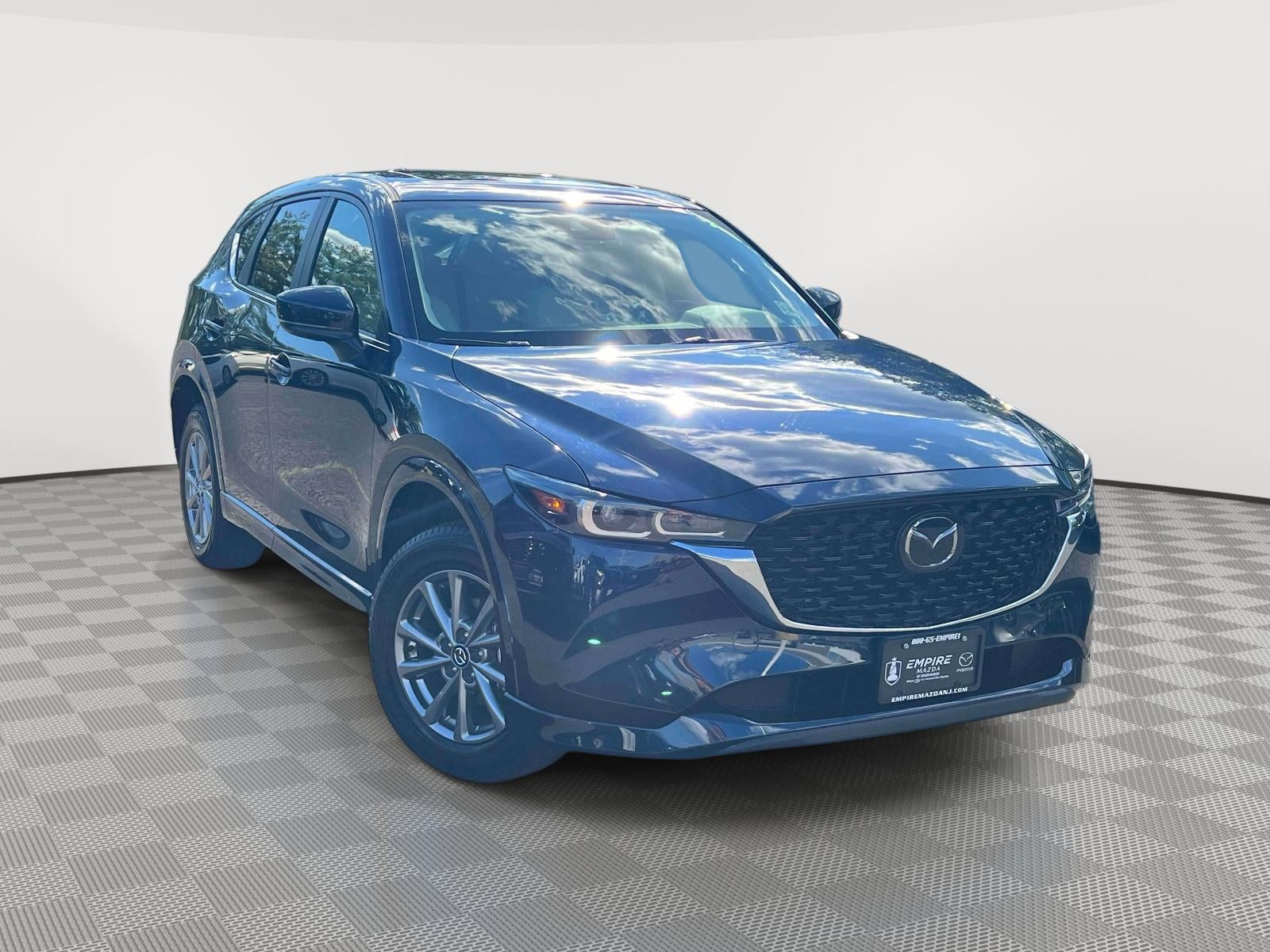 2025 Mazda Mazda CX-5 2.5 S Preferred in Deep Crystal Blue Mica — front three-quarter view