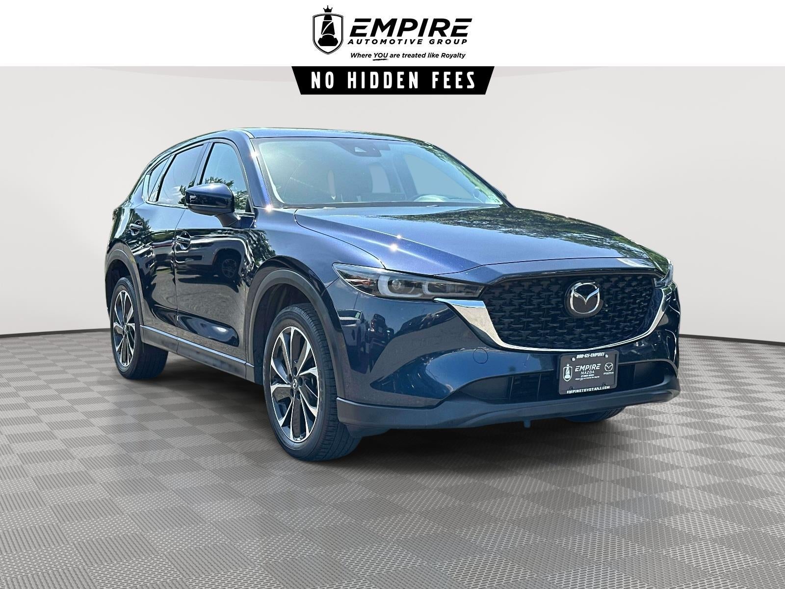 2023 Mazda Mazda CX-5 2.5 S Premium Plus in Deep Crystal Blue Mica — front three-quarter view