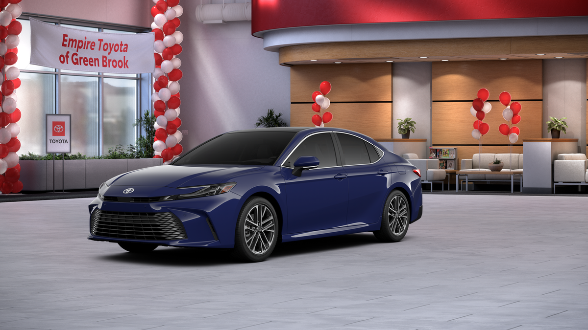 2026 Toyota Camry XLE AWD in Reservoir Blue — front three-quarter view