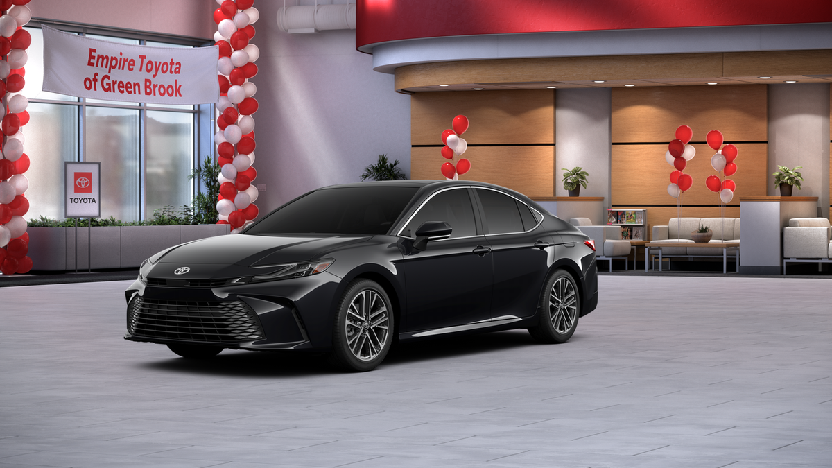 2026 Toyota Camry XLE AWD in Midnight Black Metallic — front three-quarter view