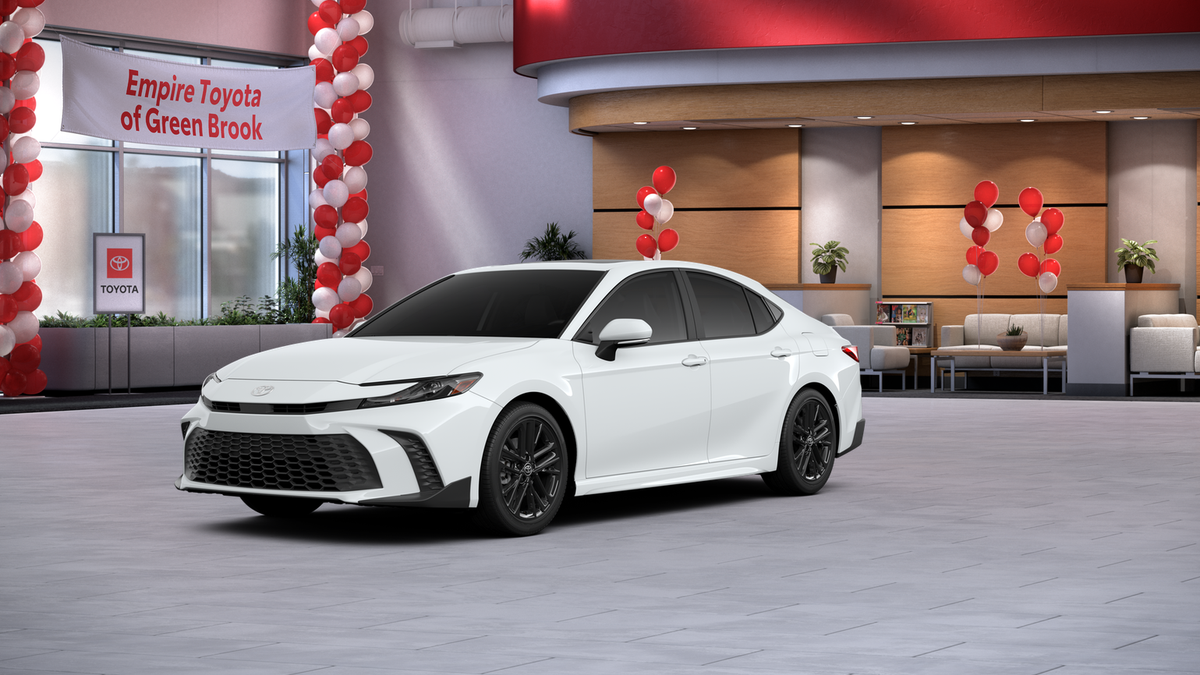 2026 Toyota Camry SE AWD in Ice Cap — front three-quarter view