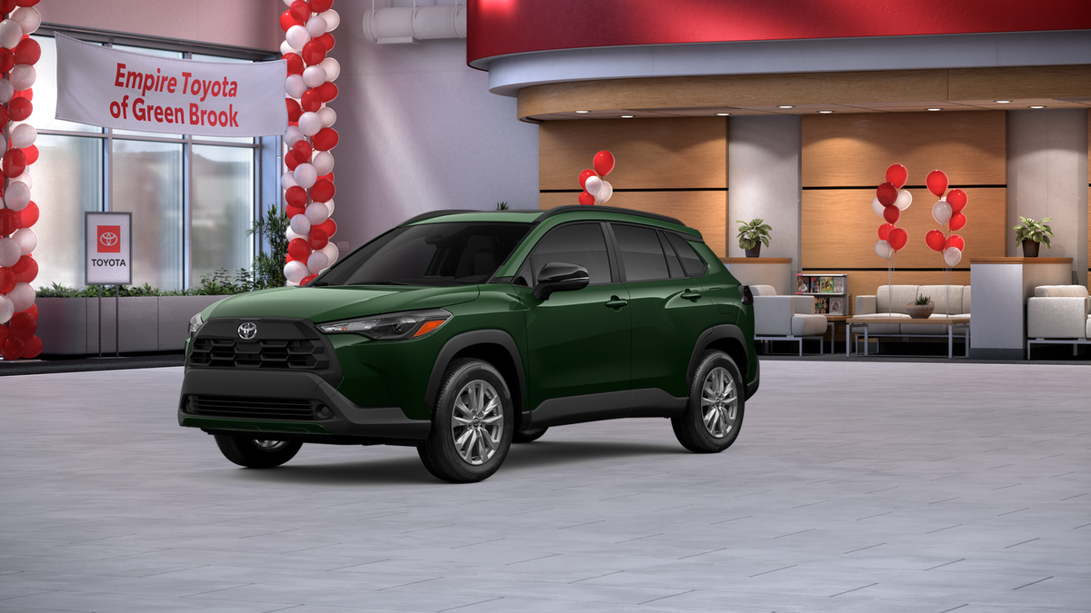 2026 Toyota Corolla Cross LE in Cypress — front three-quarter view